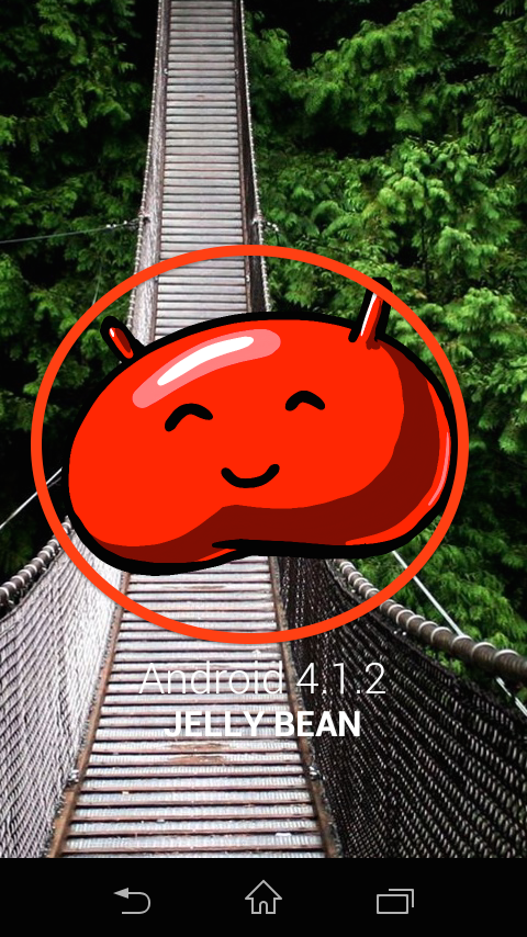 A red Jelly Bean with an anime-style smiley face along with the Android version number and name below it in white letters