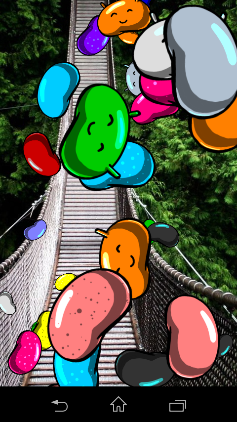 different colors and sizes of jelly beans floating around the screen - some with smiley faces, some without.